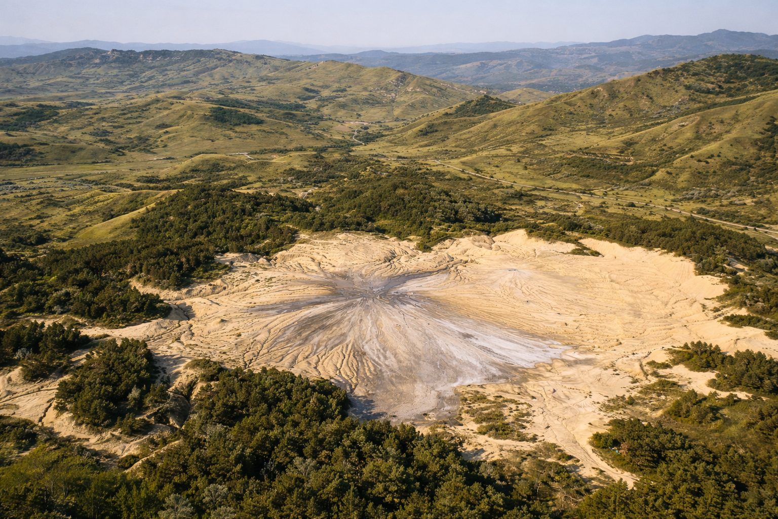 Cracked ground and low bubbling vents